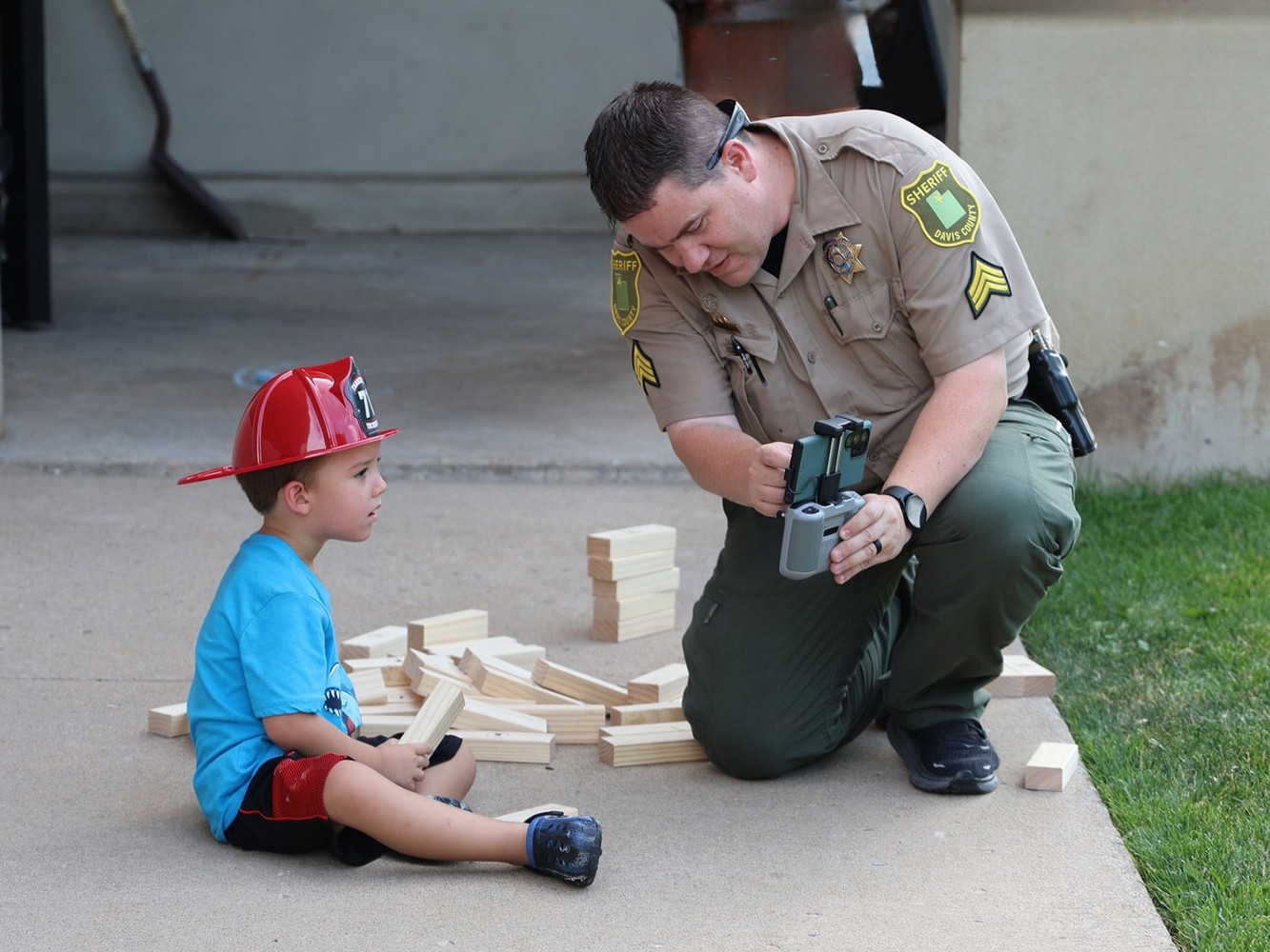 Davis County sheriff with kid